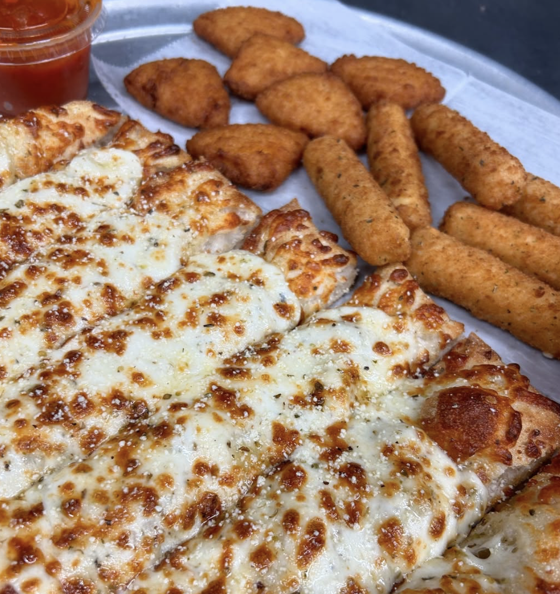 Annie's pizza and appetizers ready to share